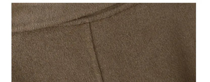 Long grey wool coat with suit collar shown in black and caramel colours on a male model