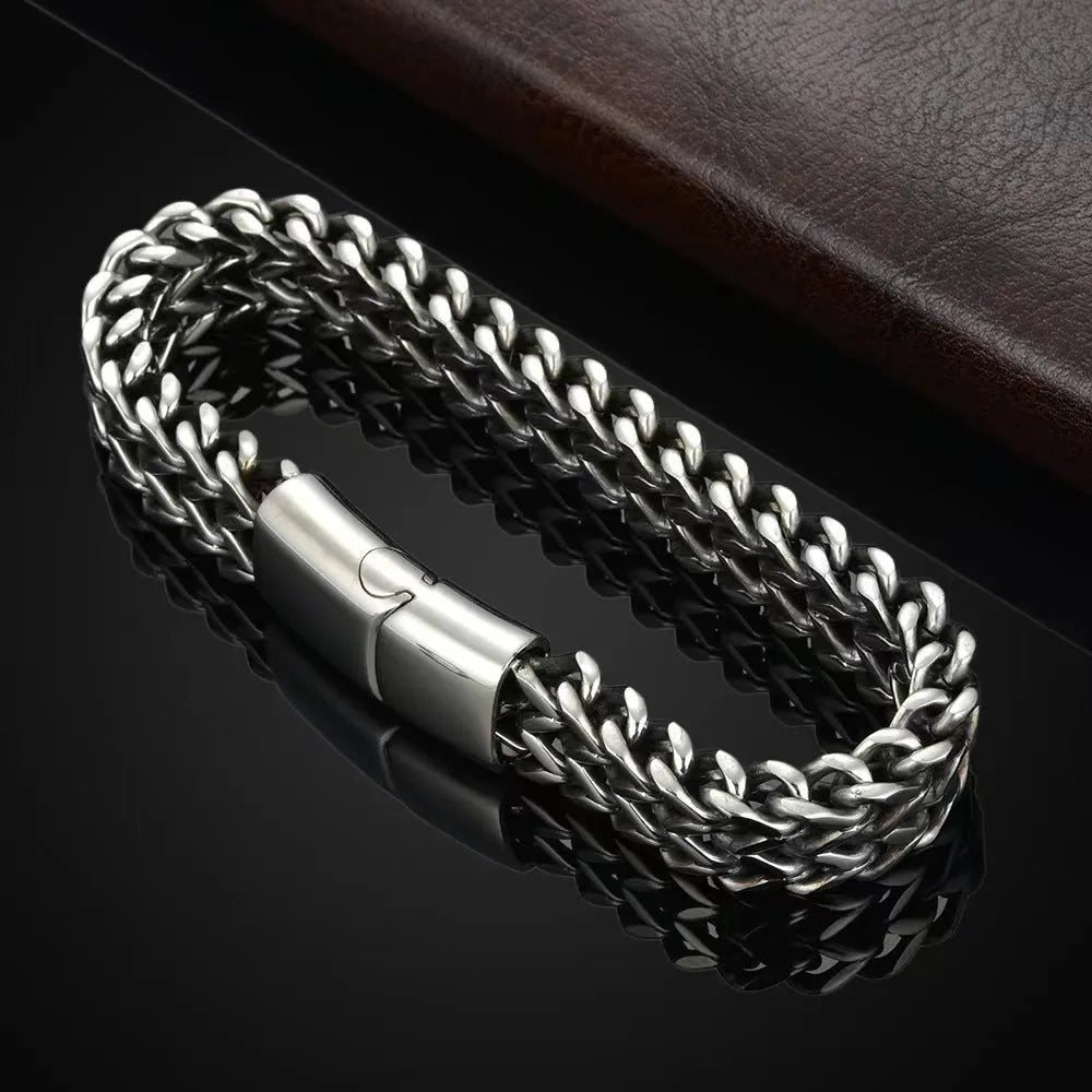 Silver stainless steel hip hop bracelet with geometric pattern showing front and back design