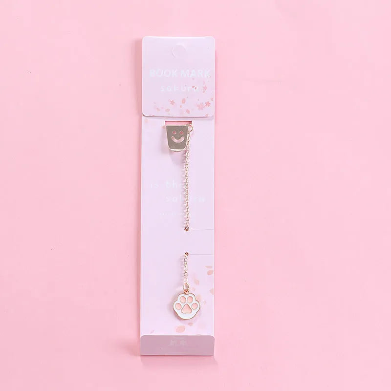 Alloy metal cartoon pendant bookmark with colourful charms including panda, rocket, and wishing bottle designs