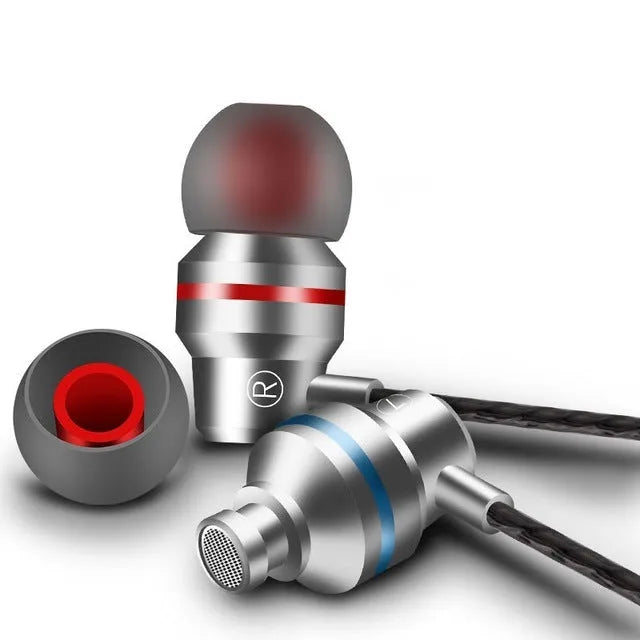 Wired in-ear headphones with a black cable, 3.5mm plug, and detachable silicone earplugs in various colours.
