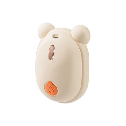 Pink and yellow rechargeable pet grooming comb with detachable head and spray function.