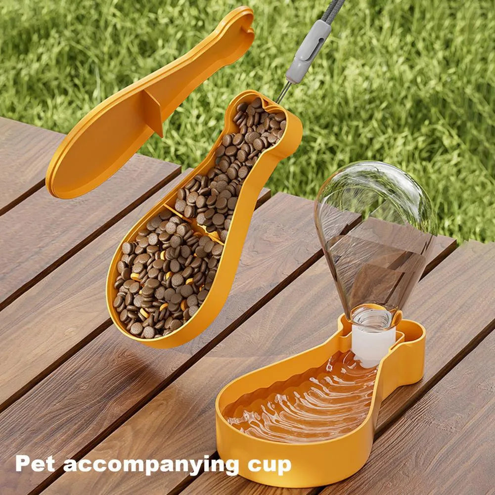 Orange and white portable pet water bottle with attached food container and carry sling.
