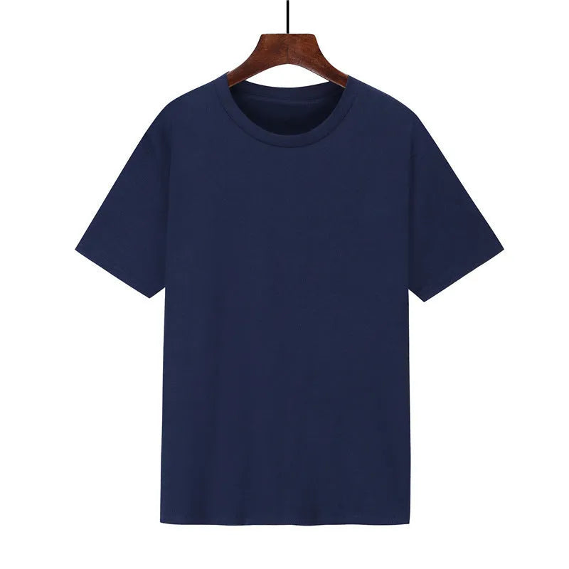 A man's loose-fitting black cotton T-shirt with short sleeves on a hanger.
