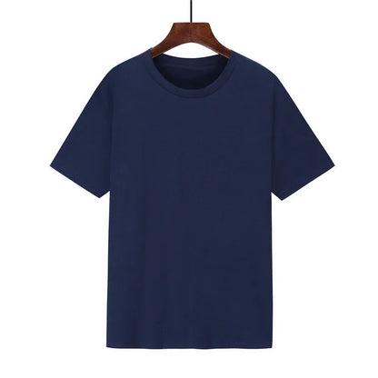 A man's loose-fitting black cotton T-shirt with short sleeves on a hanger.
