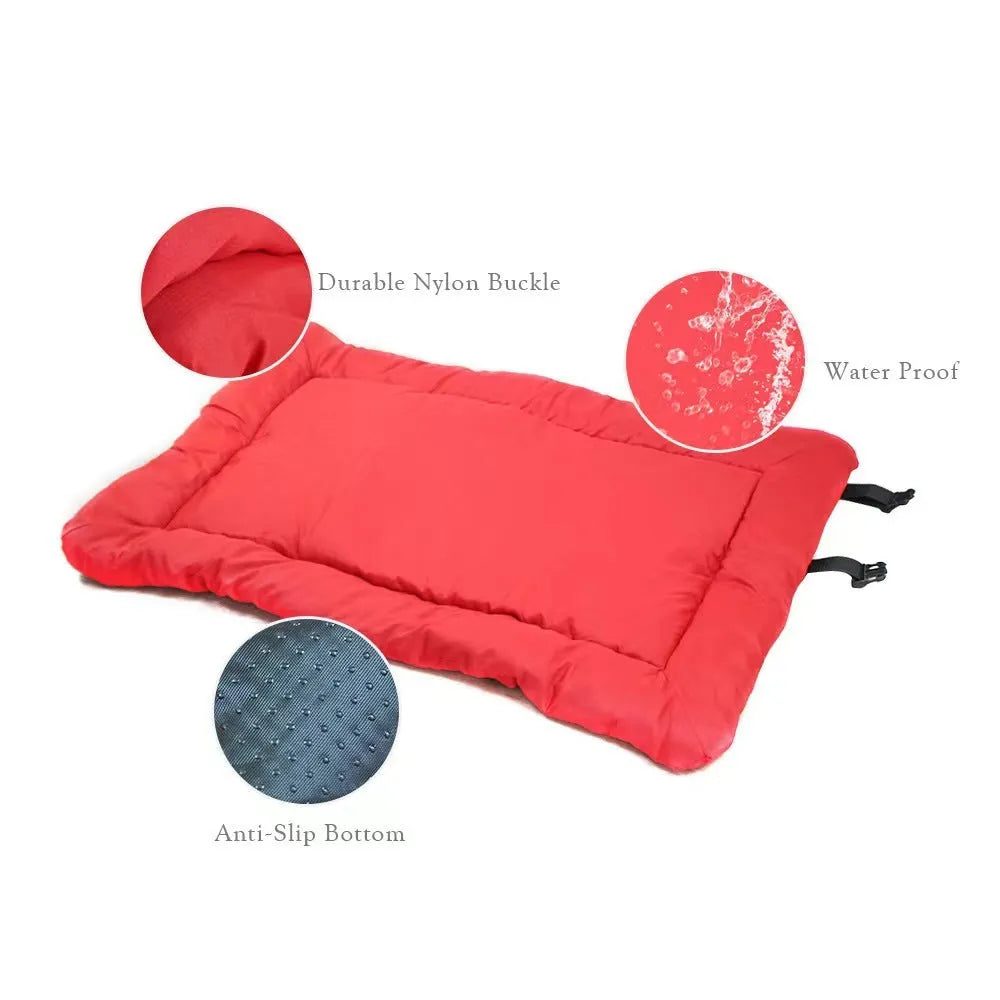 Blue foldable outdoor dog bed shown both fully unfolded and folded with buckles, on grass.