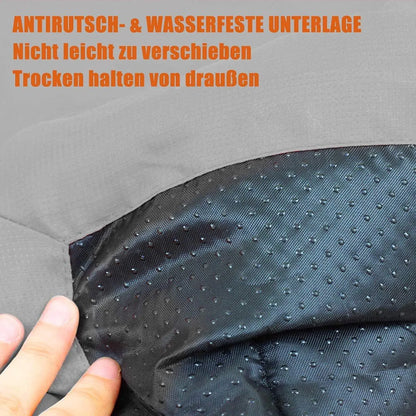 Blue foldable outdoor dog bed shown both fully unfolded and folded with buckles, on grass.