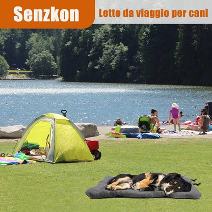 Blue foldable outdoor dog bed shown both fully unfolded and folded with buckles, on grass.