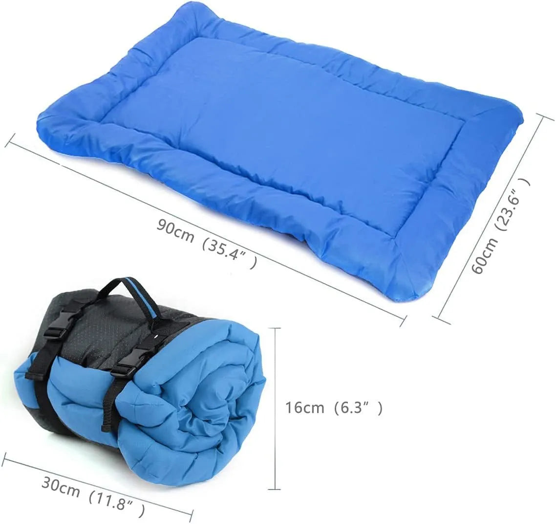 Blue foldable outdoor dog bed shown both fully unfolded and folded with buckles, on grass.