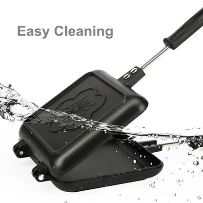 Black double-sided aluminium sandwich pan measuring 34cm with heat-proof handle for cooking
