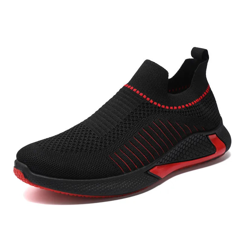 Men's black and white striped slip-on sneakers with lace-up front and mesh upper.