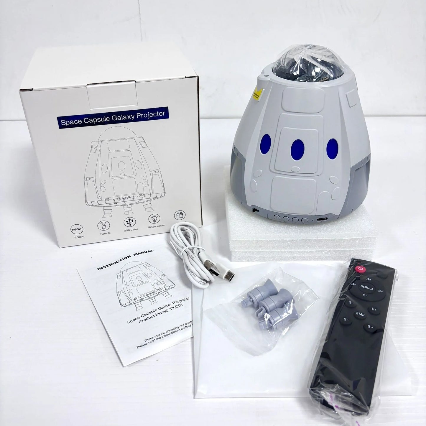 USB-powered starry atmosphere projection lamp in compact 14.5cm capsule design with remote control