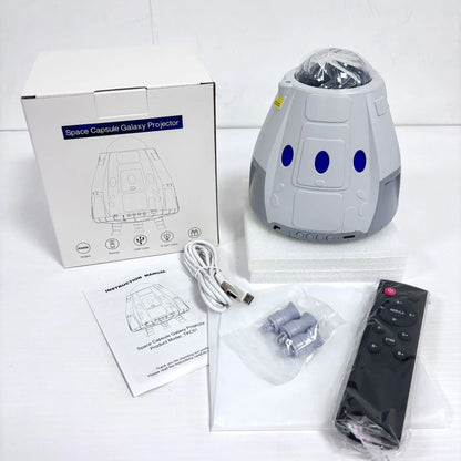 USB-powered starry atmosphere projection lamp in compact 14.5cm capsule design with remote control