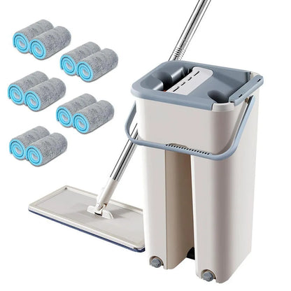 Blue flat floor mop with rotating head and microfiber pad beside plastic bucket for floor cleaning
