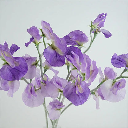 Artificial silk pea flower single stem in pink, purple, red, or white colours measuring 40cm height