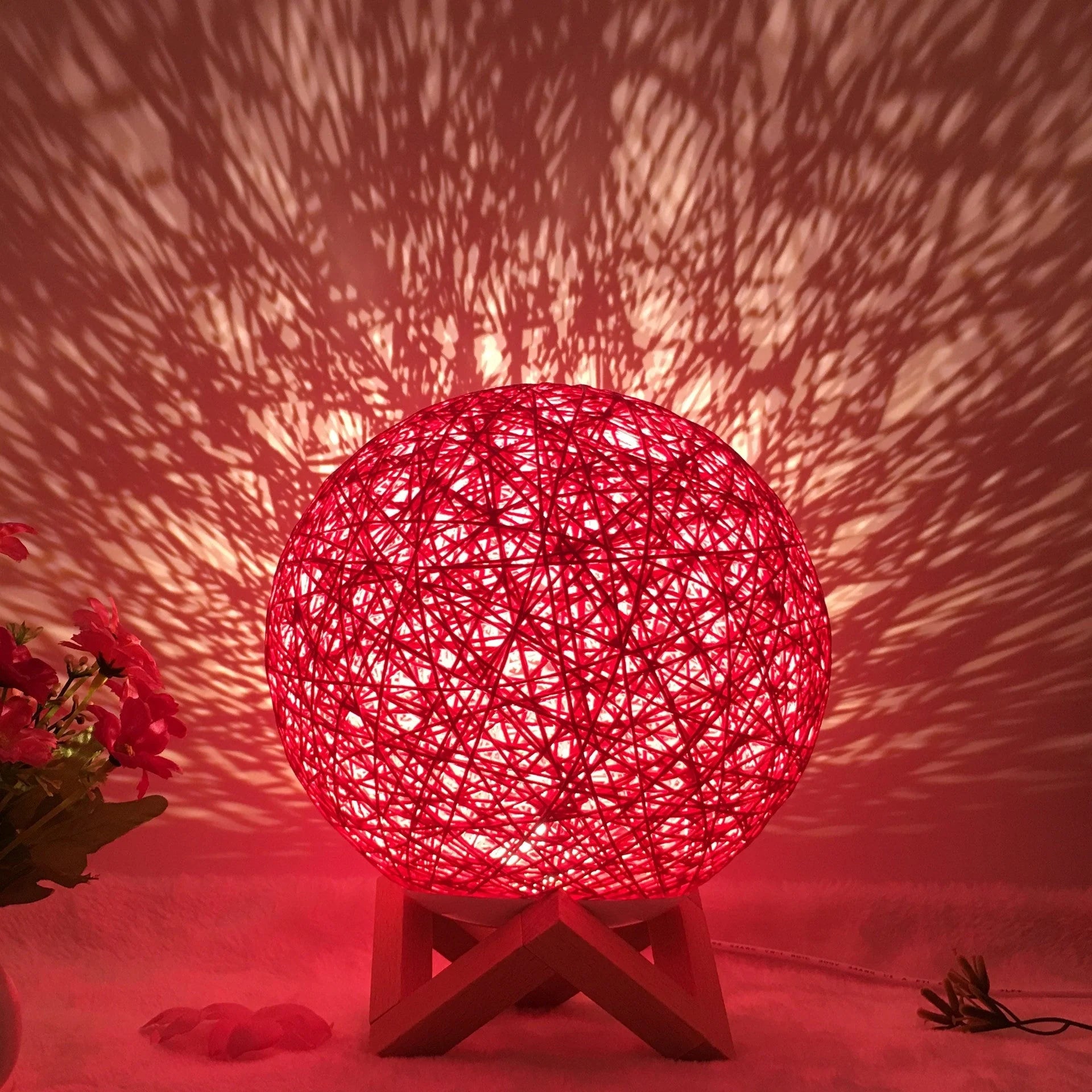 LED rattan table lamp with hand-knit linen shade in various colours