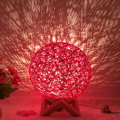 LED rattan table lamp with hand-knit linen shade in various colours