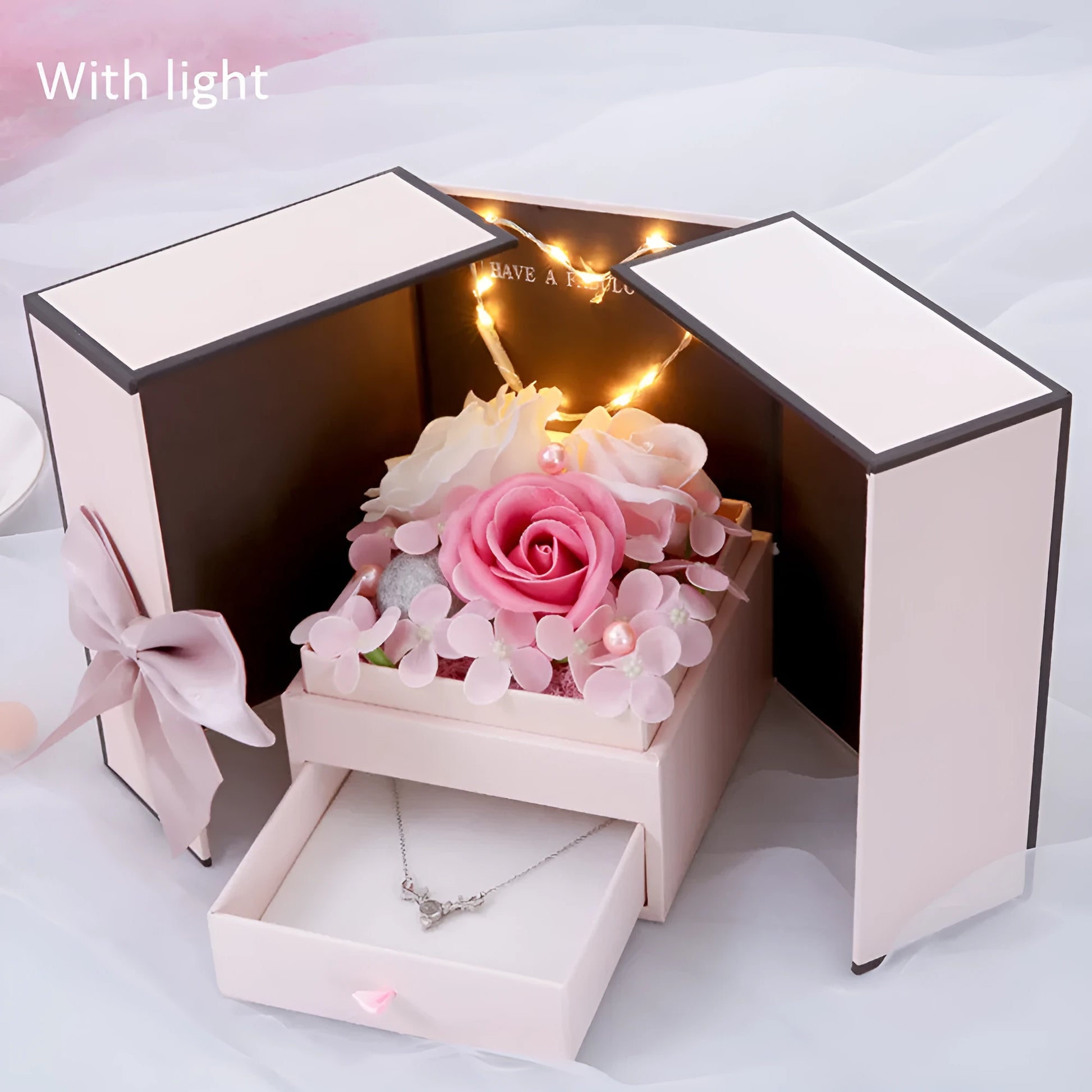 Handmade pink rose soap flower decorative lamp inside a gift box