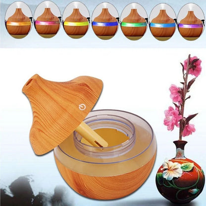 Compact wood grain USB humidifier with 300ml capacity, yellow wood-grain finish, LED lights, for aromatherapy misting