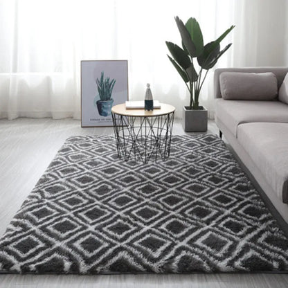 Long pile tie-dyed gradient polyester carpet showing abstract colour transition