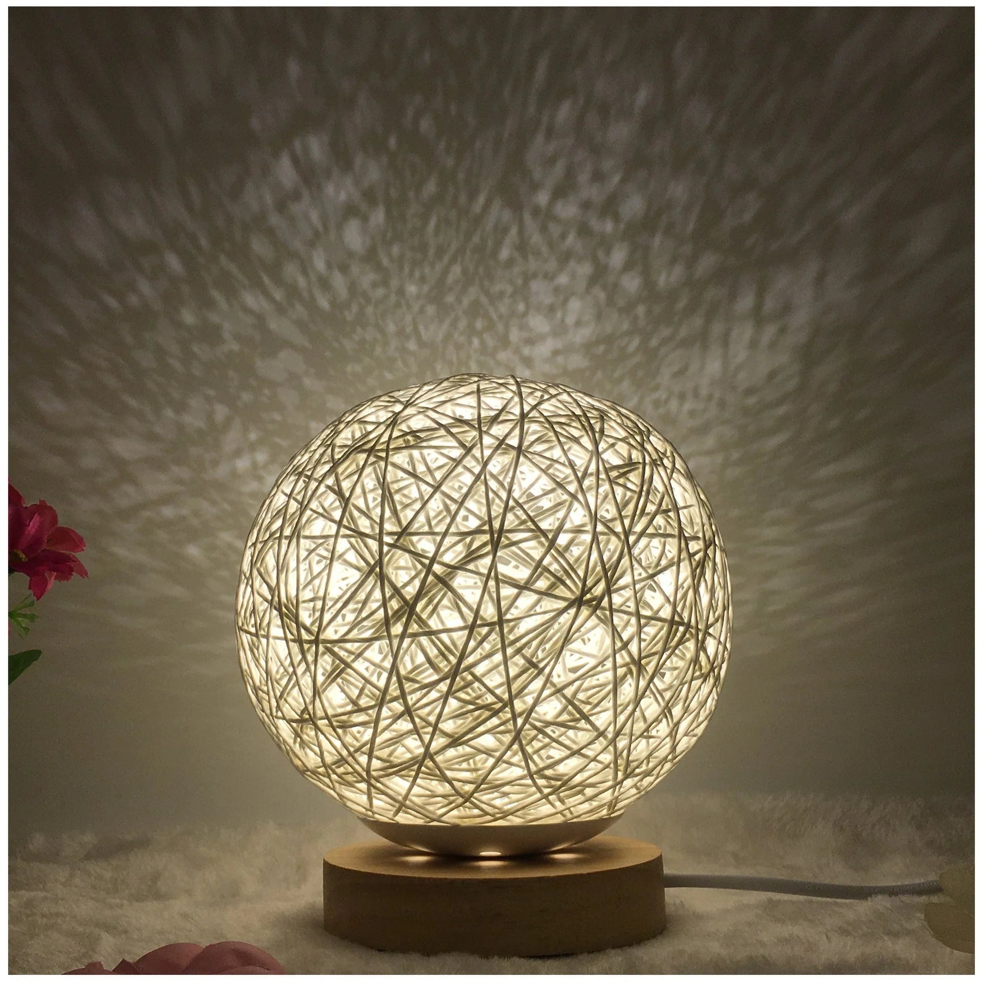 LED rattan table lamp with hand-knit linen shade in various colours