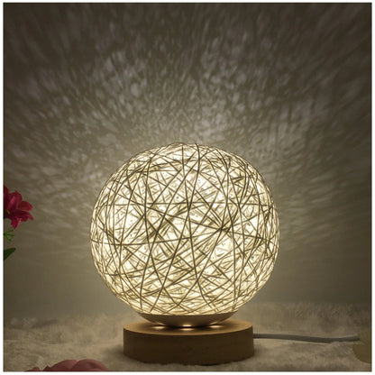 LED rattan table lamp with hand-knit linen shade in various colours