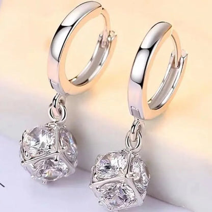 Geometric copper women's earrings with zircon accents and rose design elements in multiple colour variations