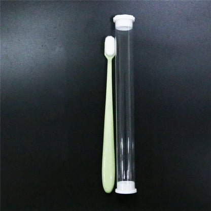 Micron soft toothbrush with coloured handles and different bristle styles including flat head and wavy designs