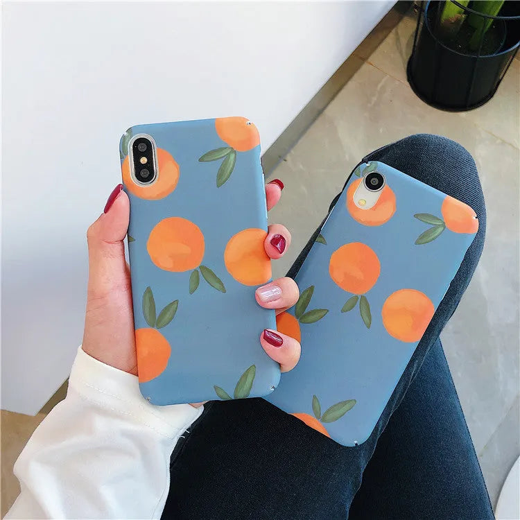Orange plastic iPhone case with blue water pattern, retro back cover design.