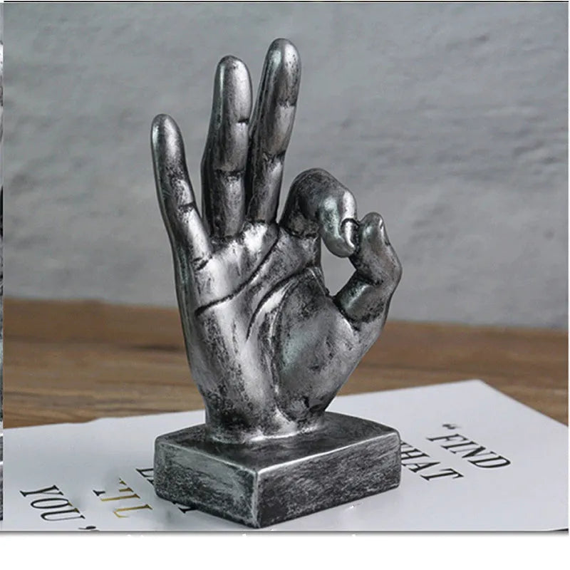 Resin gesture ornament in bronze finish showing hand making OK sign, 10cm tall desktop decoration