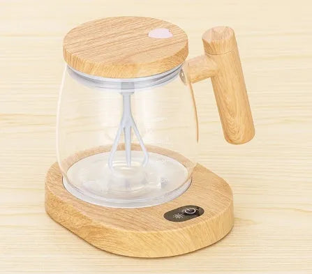 Clear borosilicate glass electric self-stirring coffee mug with 400ml capacity.
