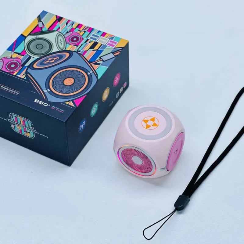 Rotating gyro bass Bluetooth speaker in black, pink or green, 53x51x51mm, with USB cable