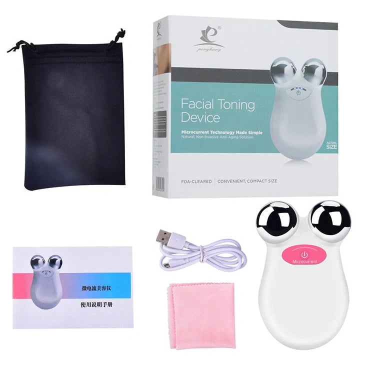Micro current beauty instrument in orange and white colours showing facial treatment application