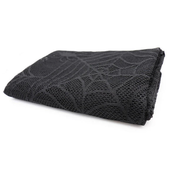 Elegant black lace tablecloth with spider web design, perfect for Halloween celebrations in the UK