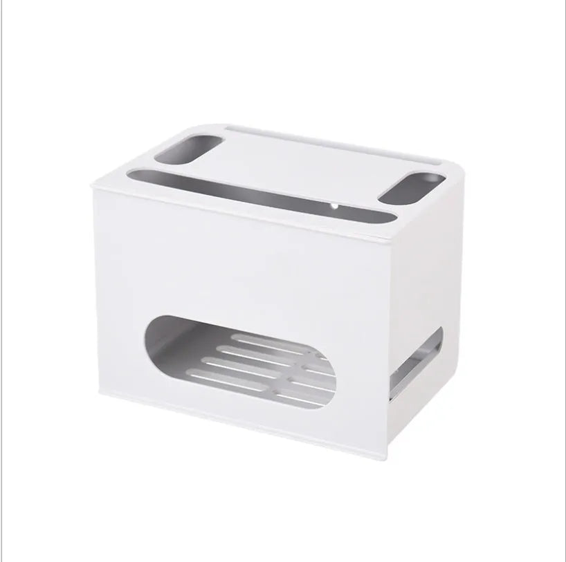 A grey and a white plastic storage box for organising a wireless router and its cables.