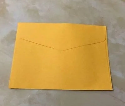Mini coloured paper envelopes in various hues measuring 11.5 by 8 centimetres