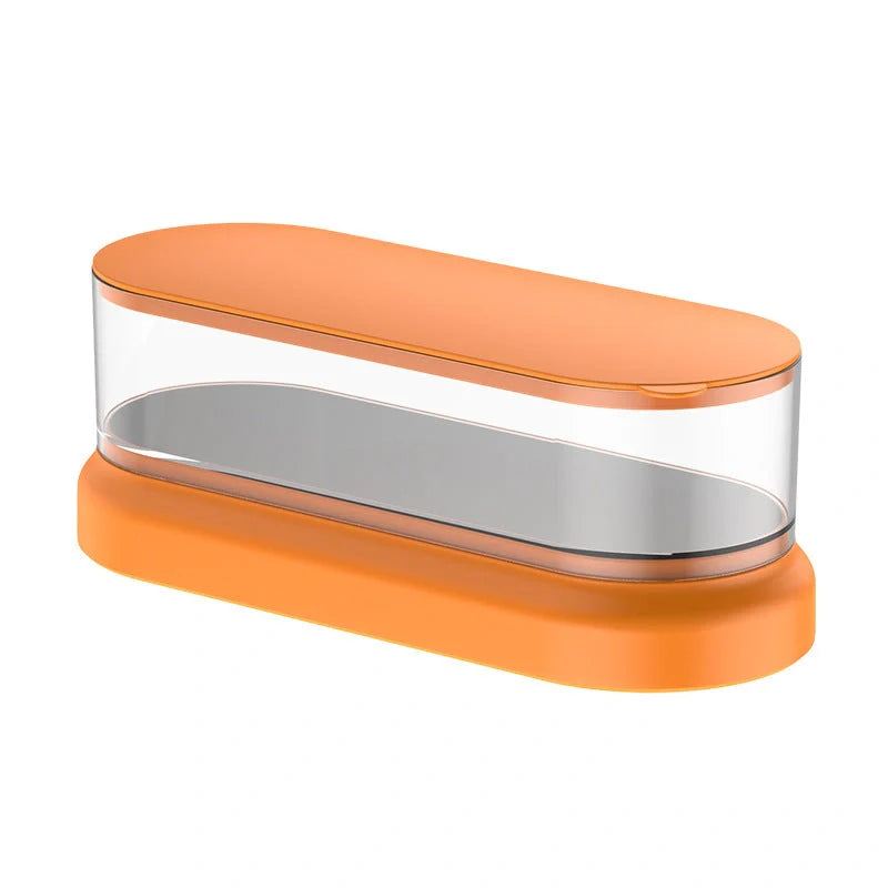 Compact ultrasonic cleaning machine for watches and small items, white colour, on a table