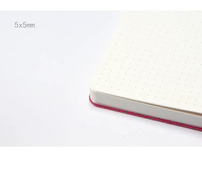 Blue soft imitation leather A5 dotted notebook open on dot grid pages.