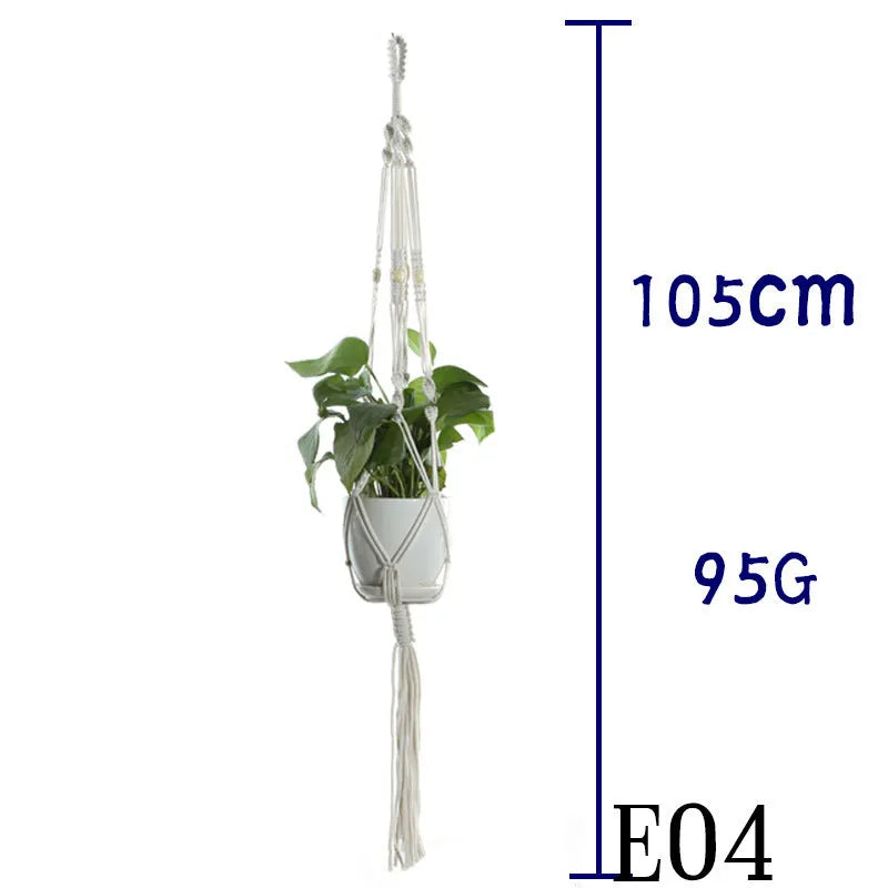 Handmade beige cotton rope net bag holding a plant pot, showing its textured sling design.