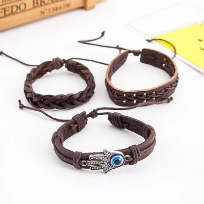 Adjustable cowhide leather men's bracelet with alloy details and PU braid