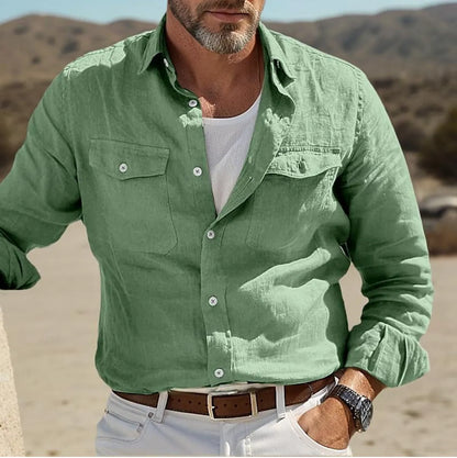 Men's long-sleeved cotton and linen shirt in green, loose fit on a hanger.