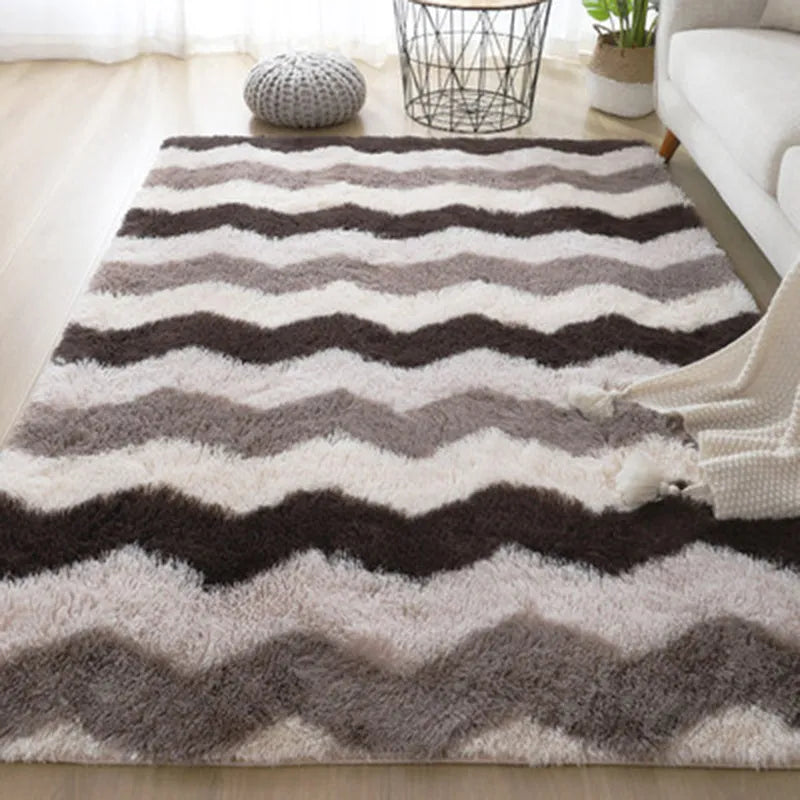 Long pile tie-dyed gradient polyester carpet showing abstract colour transition