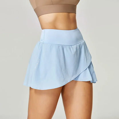 Women's solid colour quick-dry sports shorts in nylon and spandex for summer fitness activities.