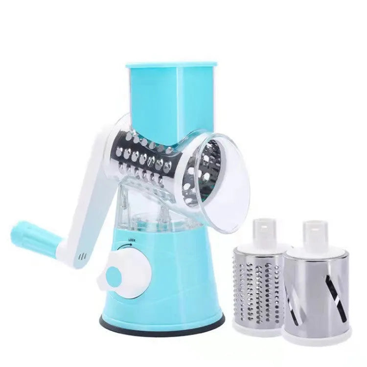 Orange multifunctional vegetable cutter kitchen tool with mandoline blades on a countertop.