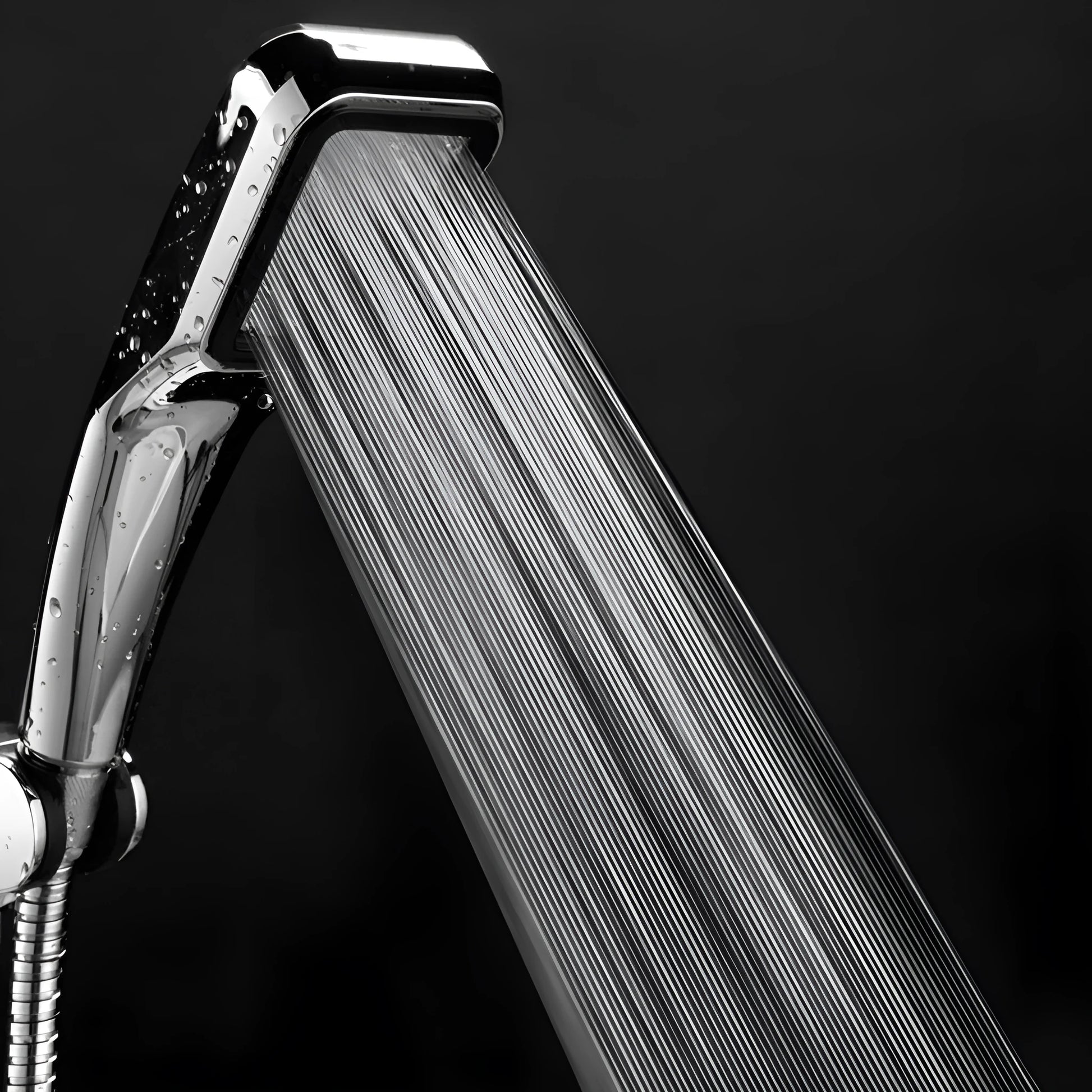 Orange hand-held pressurised shower head with rain function and attachment pieces