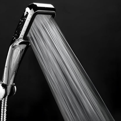 Orange hand-held pressurised shower head with rain function and attachment pieces