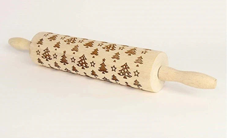 Festive rolling pin with embossed Christmas designs for easy imprinting on dough