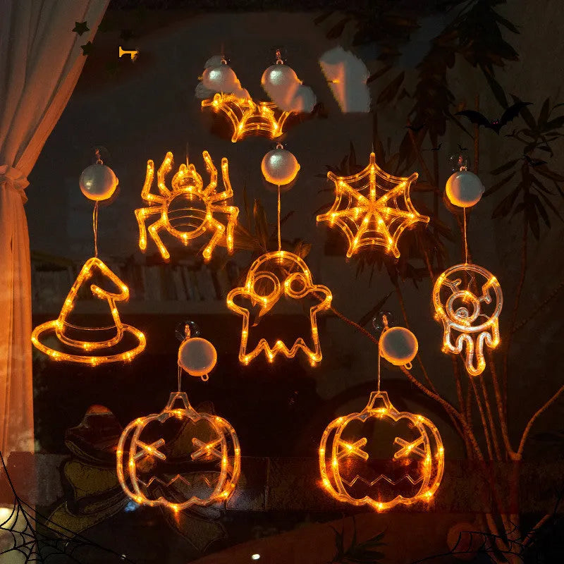 Halloween window hanging LED lights set with spider, pumpkin, and ghost designs for battery-powered holiday decorations