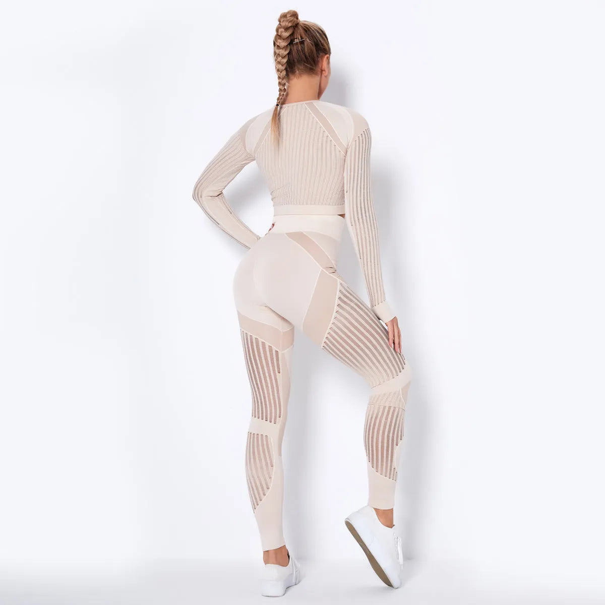 Seamless knitted yoga wearsuit for women in long-sleeved design with stripe pattern