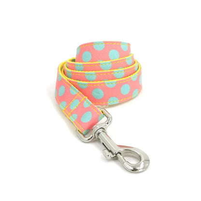 Yellow polka dot dog collar and lead set with coordinating bow, available in five sizes