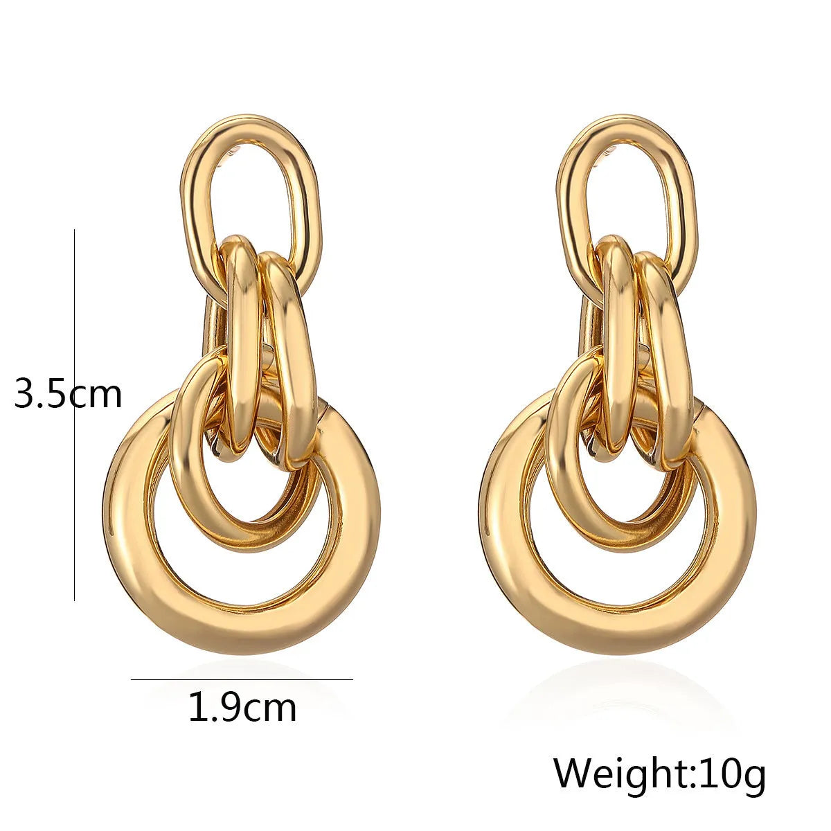 A pair of gold-coloured geometric drop earrings with irregular shapes, made from copper.